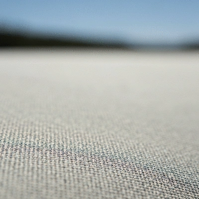 Close-up of recycled polyester fabric, showing texture and durability, clean image